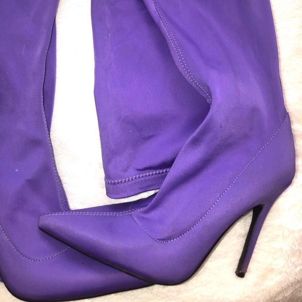 Thigh high purple heels